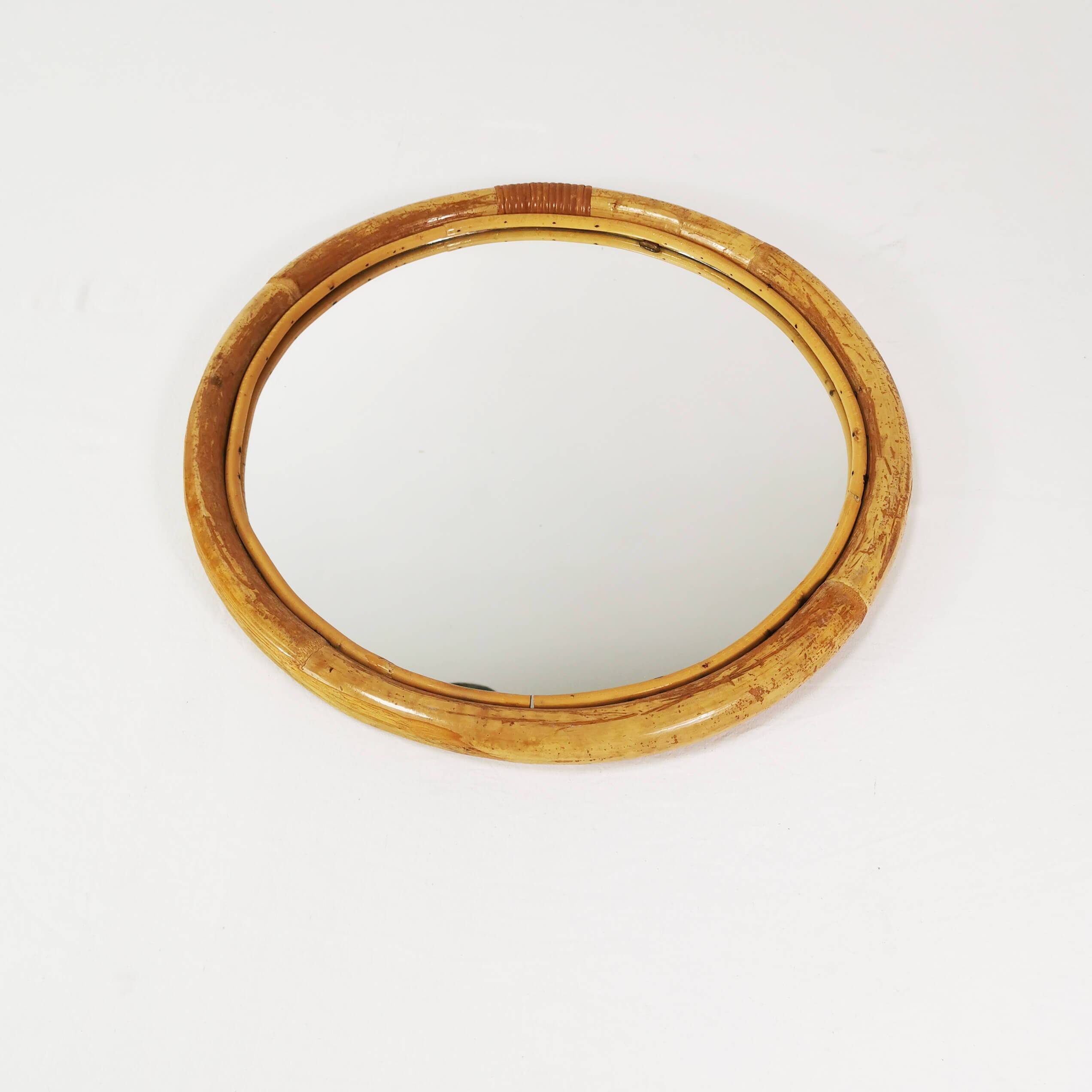 Wall-mounted, round bamboo mirror, Germany, 1970s.
