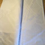 White damask tablecloth with flower pattern