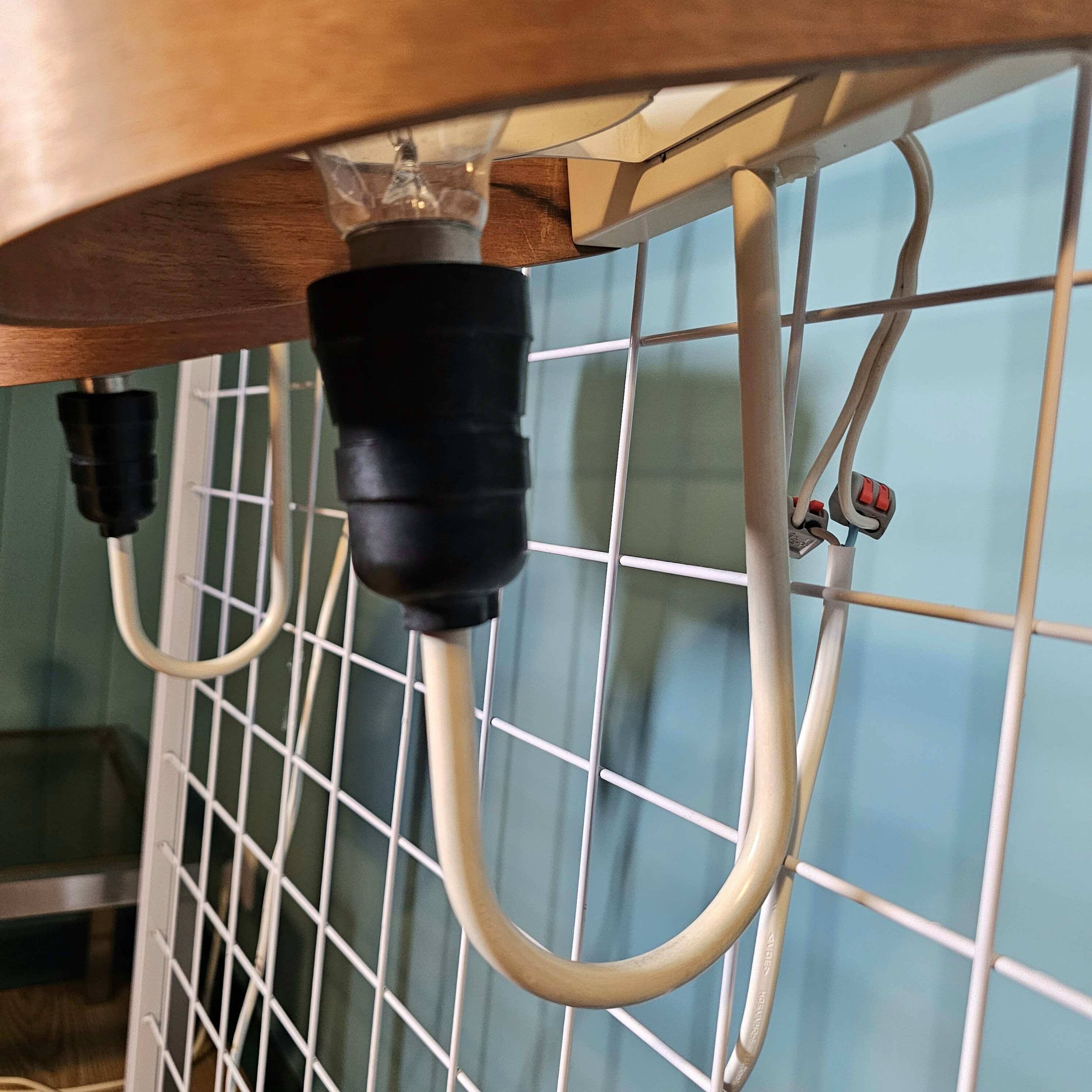 Louis kalff (1897-1976) for philips, pair of nx40 wall lights in wood, opaline glass, and lacquered metal,