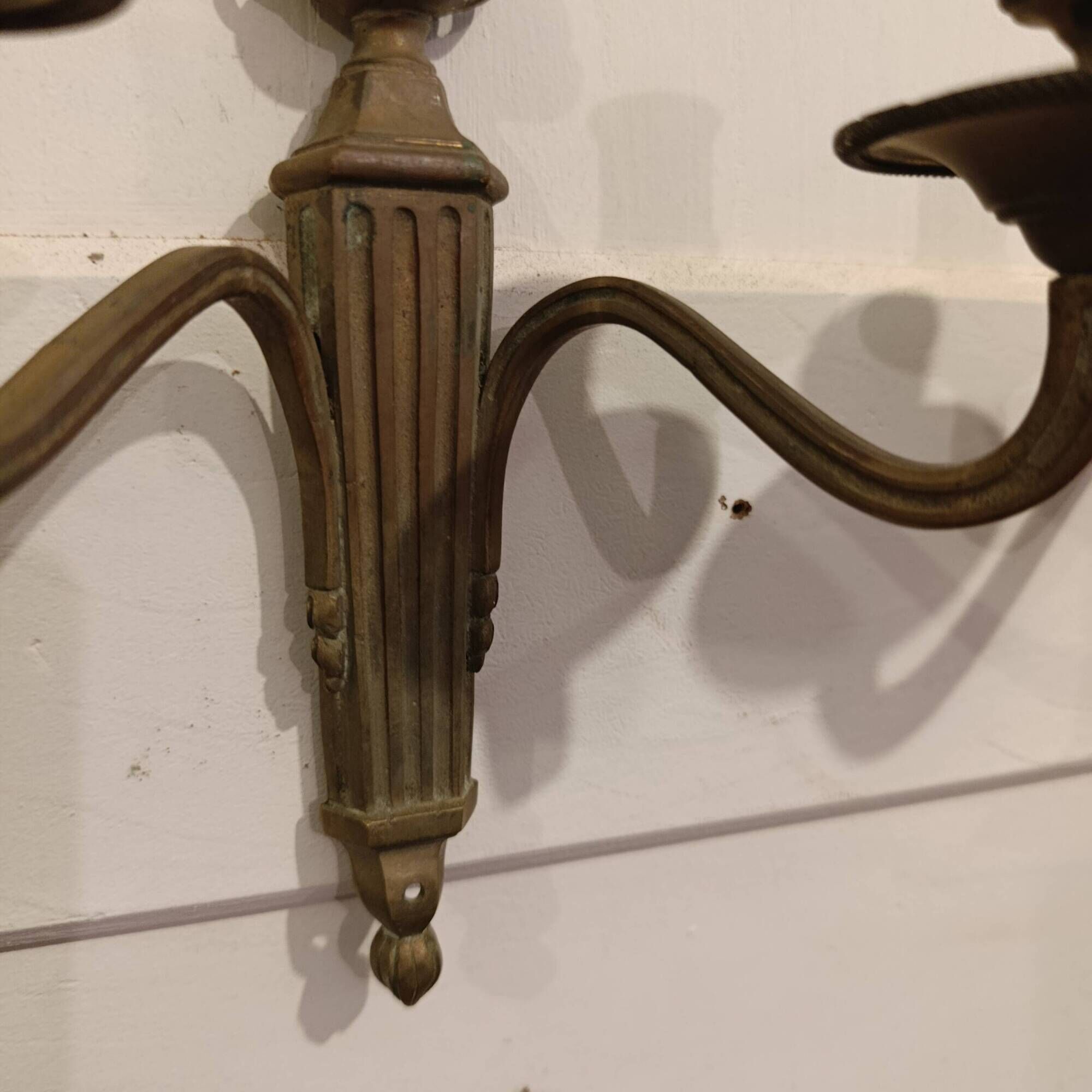 Pair of French bronze wall sconces, Louis XVI Neoclassical style, two-arm s