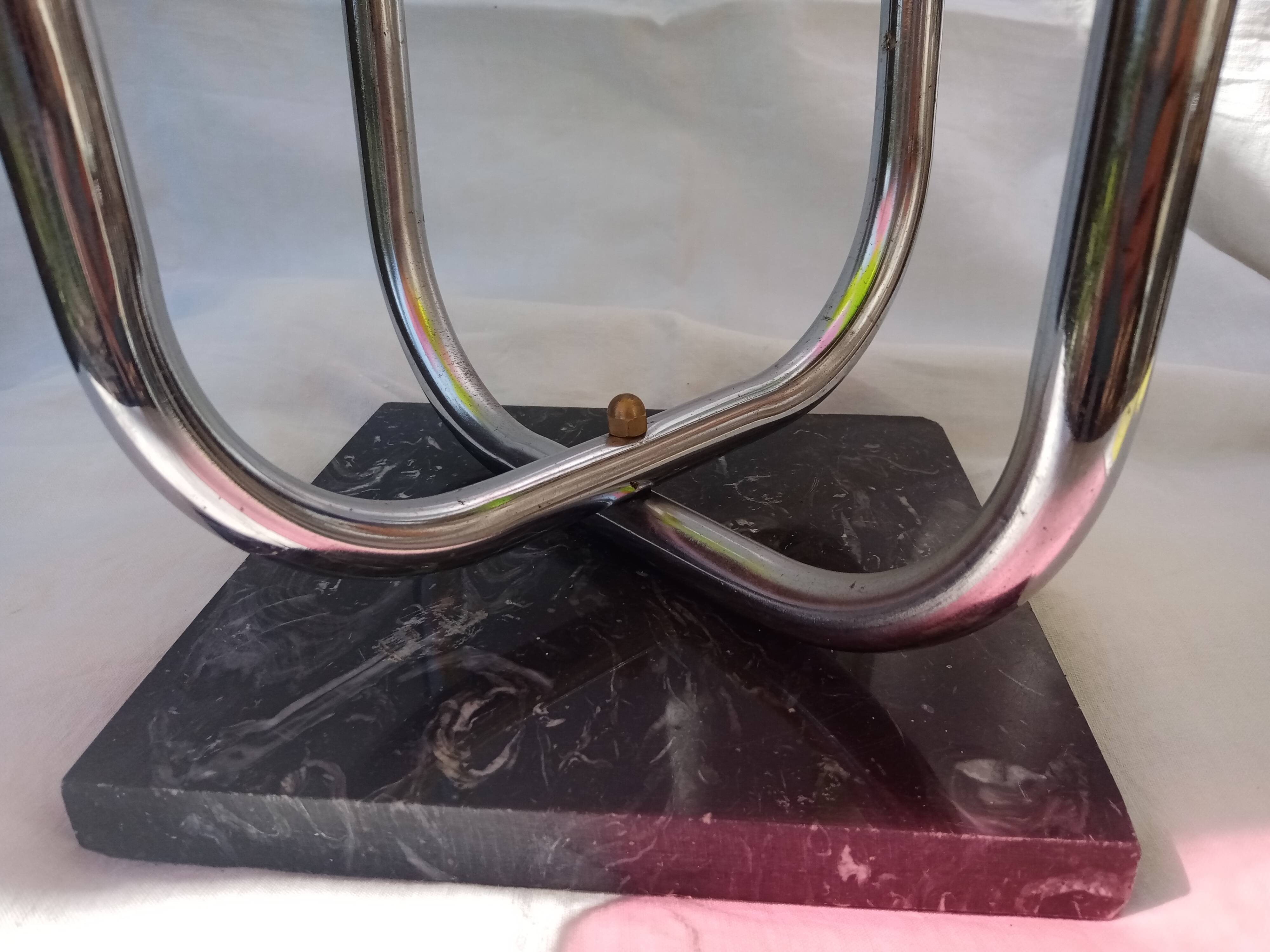 Display shelf with plexiglass trays in 1970s colours.