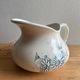 Old jug / pitcher with Daisy pattern from La Faïencerie Nouvelle in Givors.