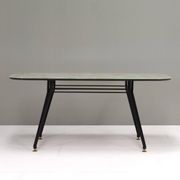 Italian dining table with metal base and glass top and brass, 1950s