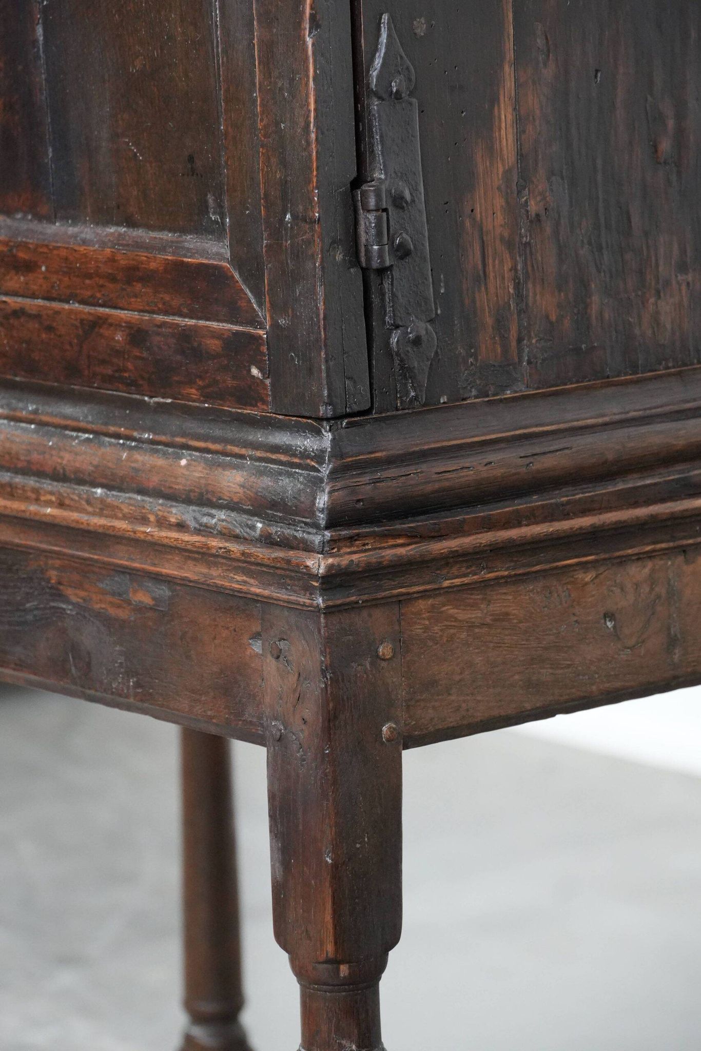 Unique antique English cabinet on stand made of oak from the 17th century