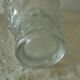 Frosted glass vase with a relief decoration of cherries.