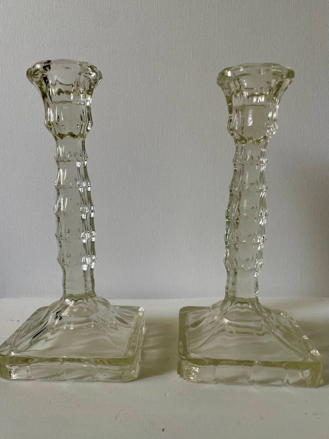Pair of molded glass candlesticks