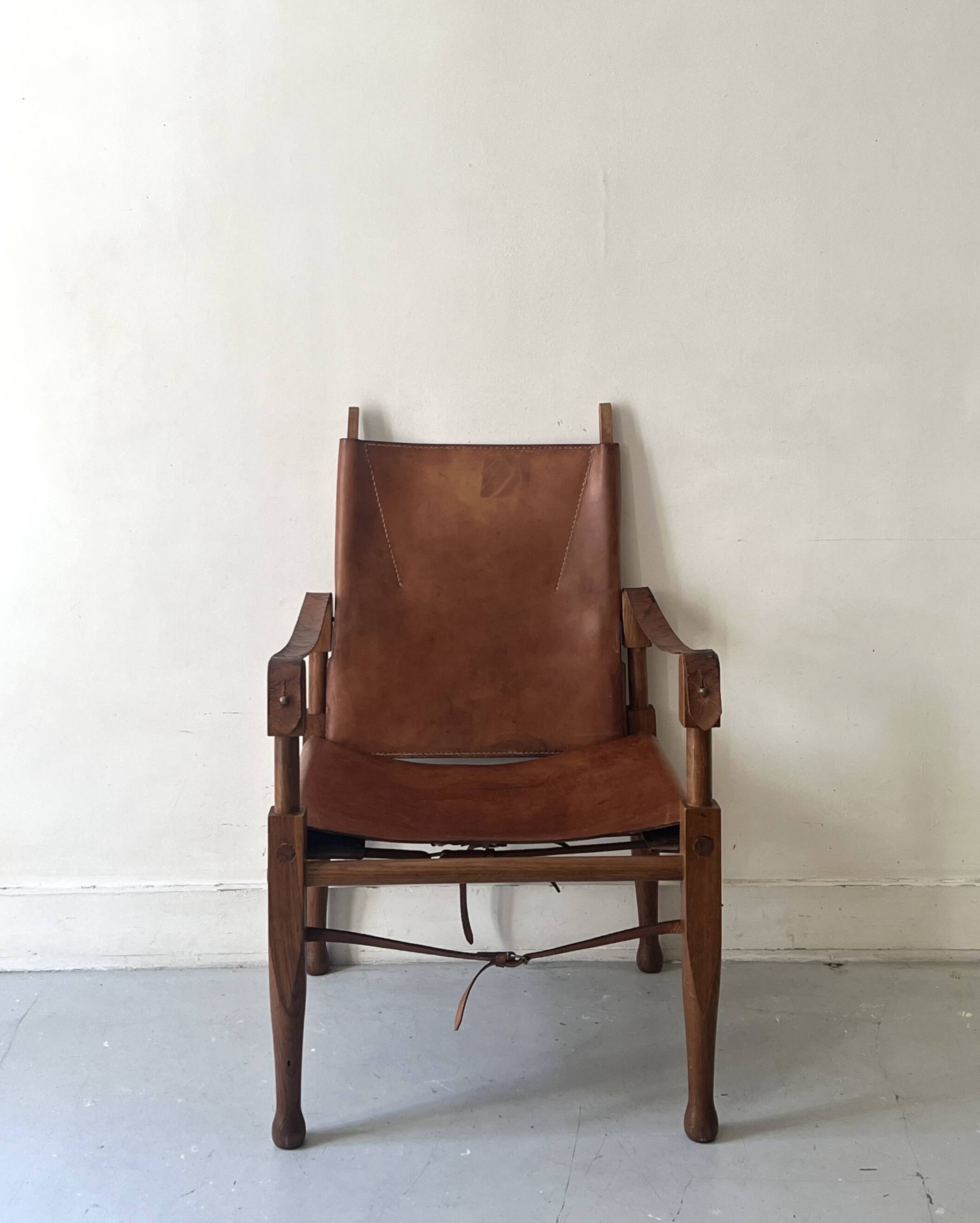 Safari armchair in wood & cognac leather by Wilhelm Kienzle for Wohnbedarf 1950