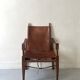 Safari armchair in wood & cognac leather by Wilhelm Kienzle for Wohnbedarf 1950