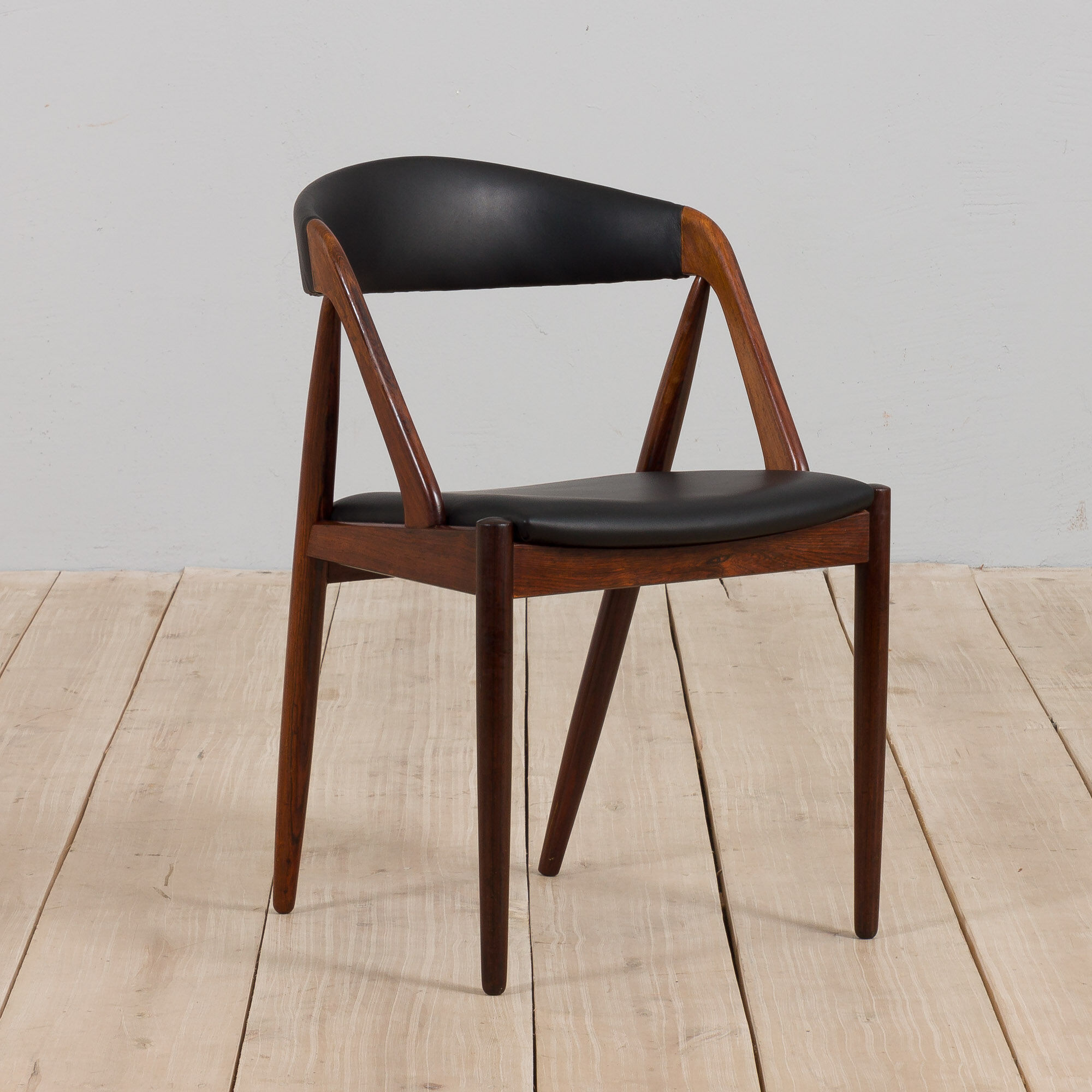 Kai Kristiansen rosewood desk chair 31 in reupholstered in soft black leather, Denmark, 60s