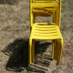 Lot of 11 yellow metallic bistro chairs from the 1950s