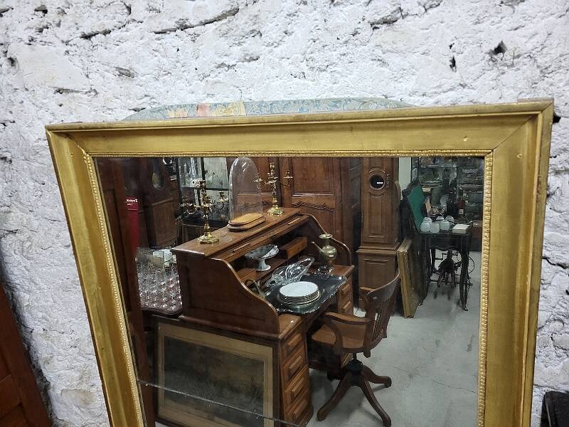 Large gilt mirror in 2 parts from the early 19th century