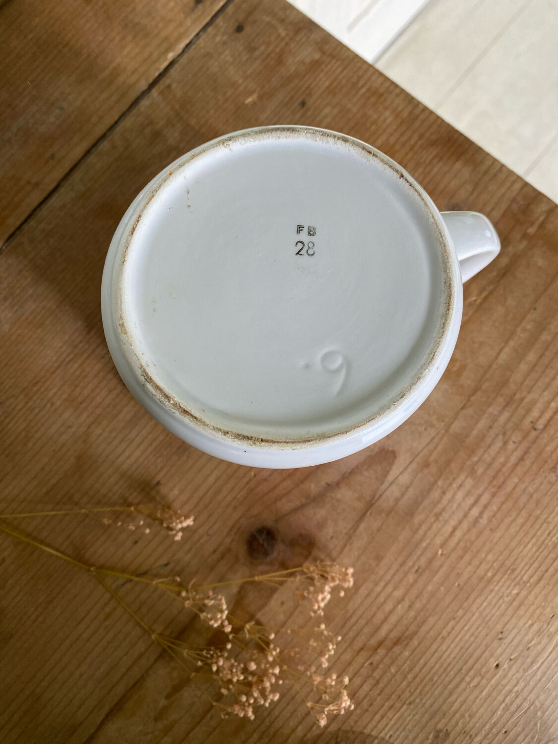 Old striped milk jug