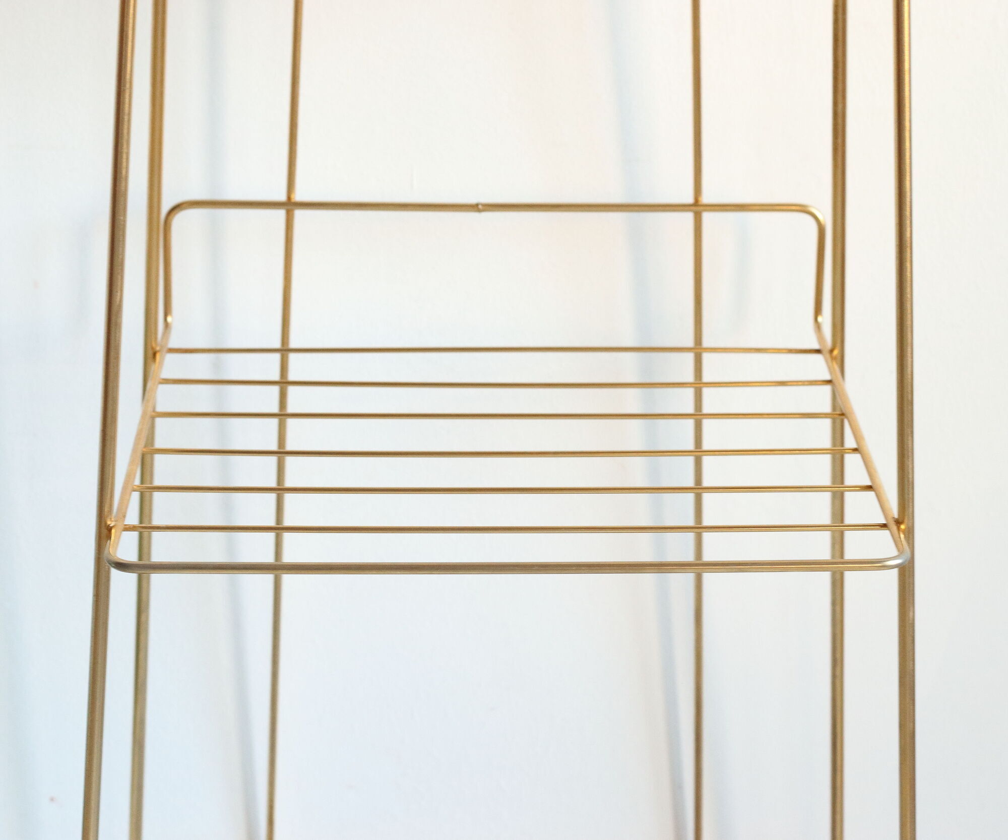 Side table in gilded brass