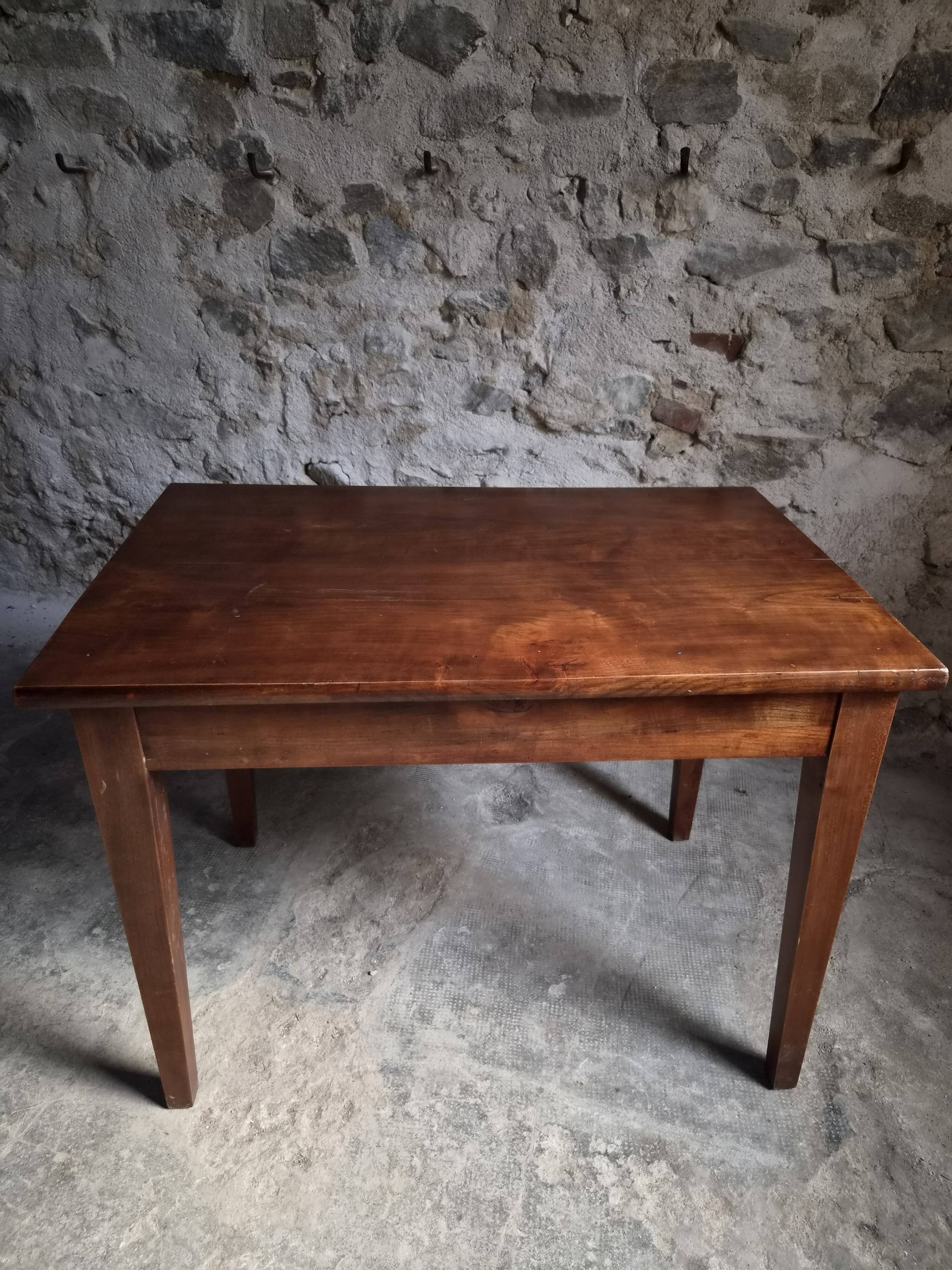 Old French table in cherry wood with bistro chair, circa 1900–1930.