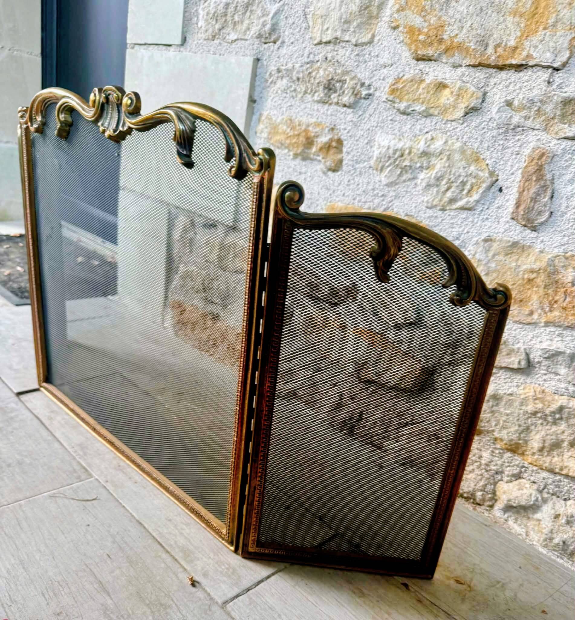 Brass fireplace screen in Louis XV style