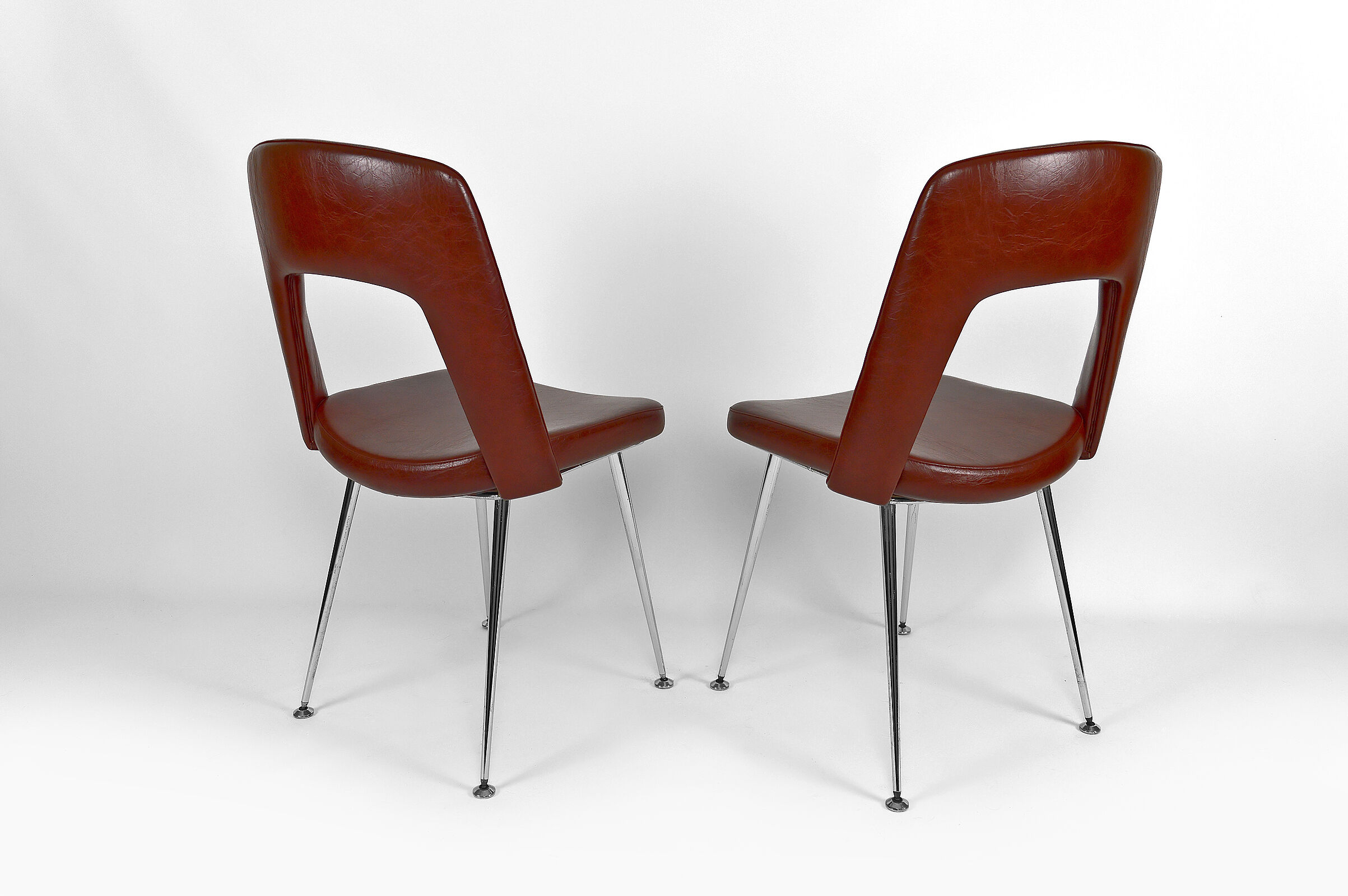 Pair of chairs in chrome and skaï, circa 1960