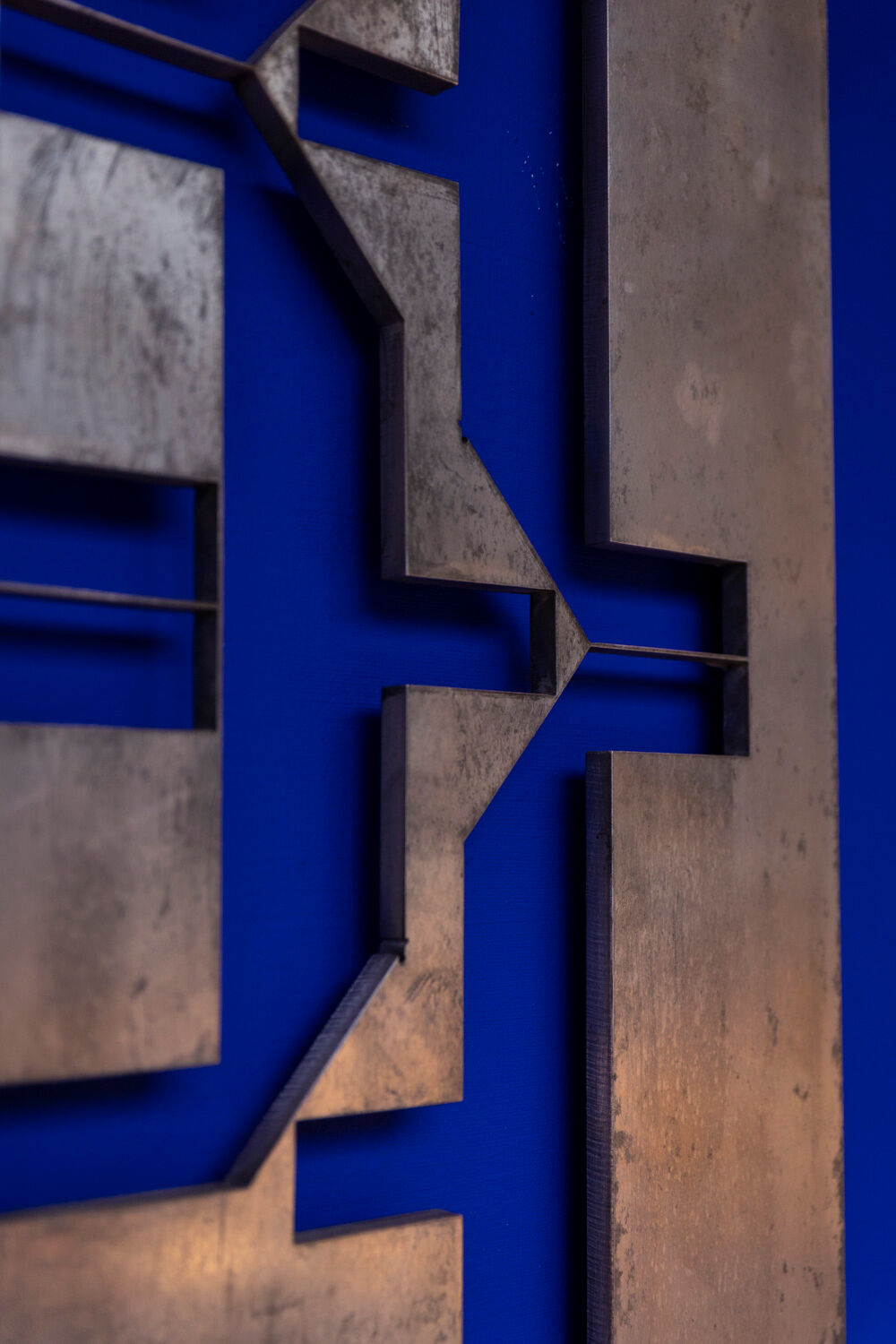 Pair of cast aluminum panels, 1970s