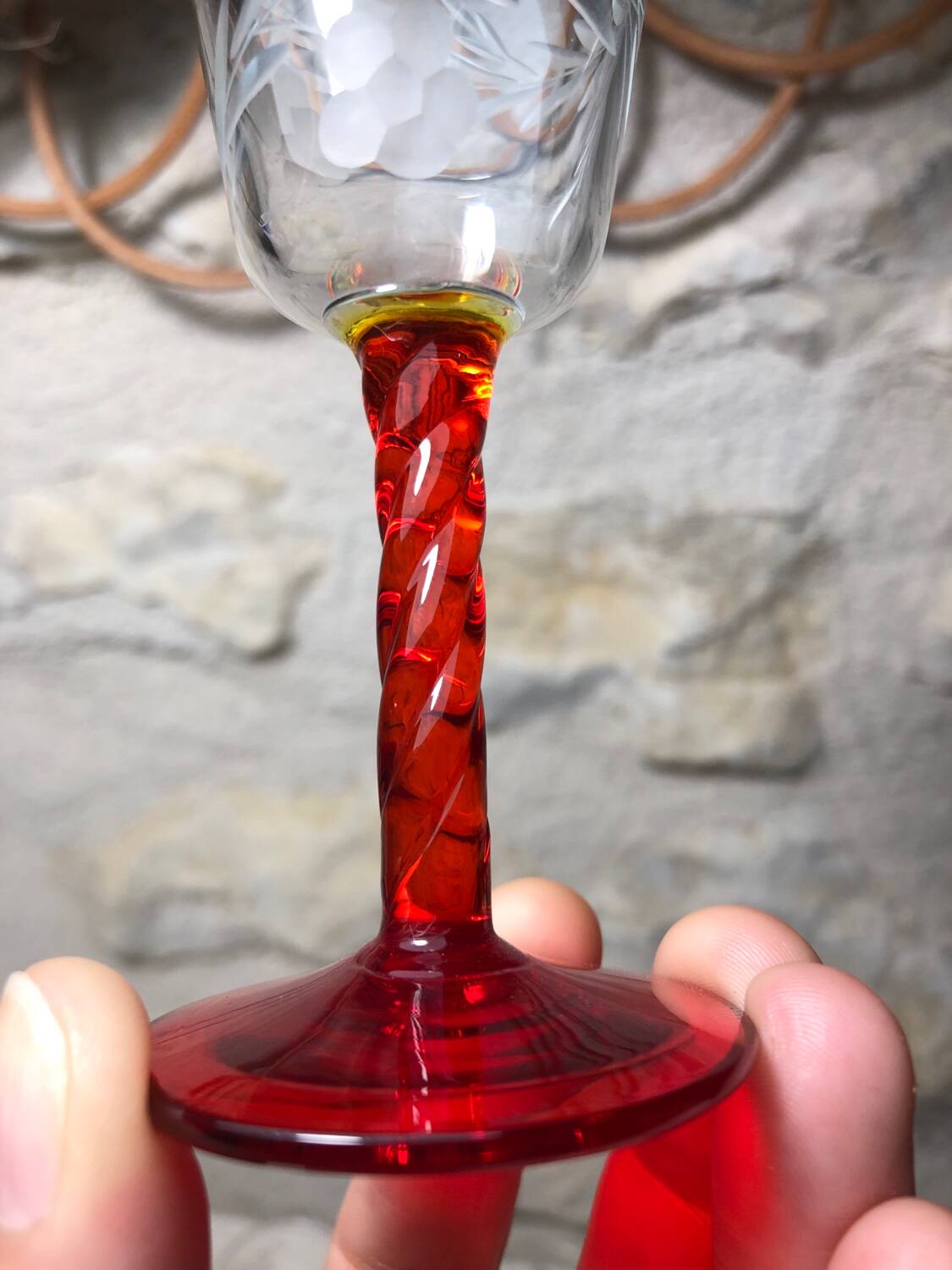 Antique and rare! Sold in a set of 12 colorful twisted stemmed glasses engraved with flowers and leaves