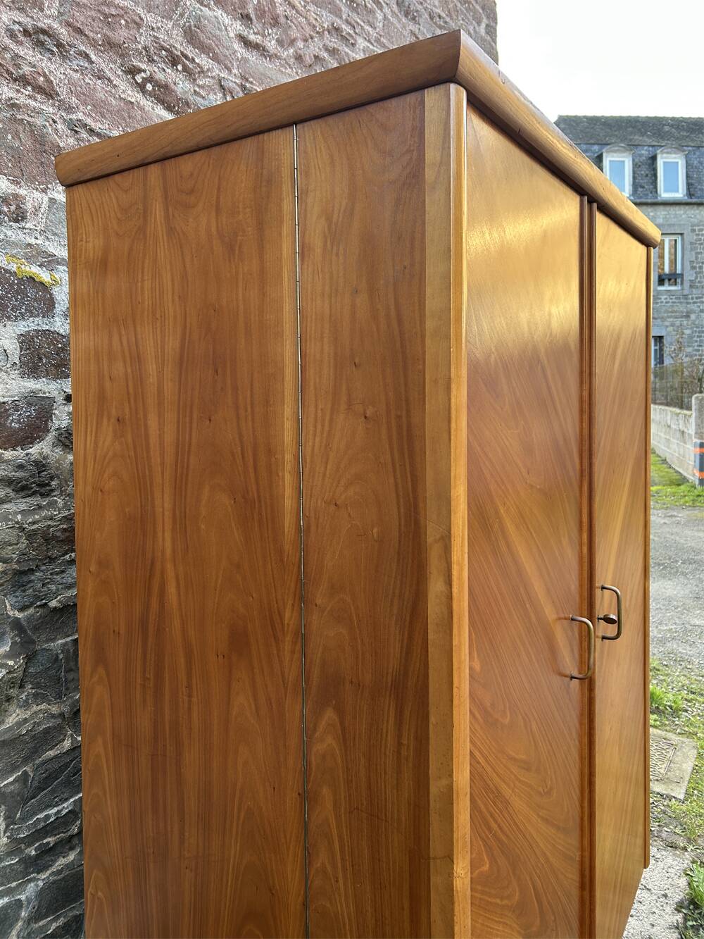 Mid-century wardrobe from the 1960s in wood, with a chevron front and tapered legs.