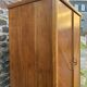 Mid-century wardrobe from the 1960s in wood, with a chevron front and tapered legs.