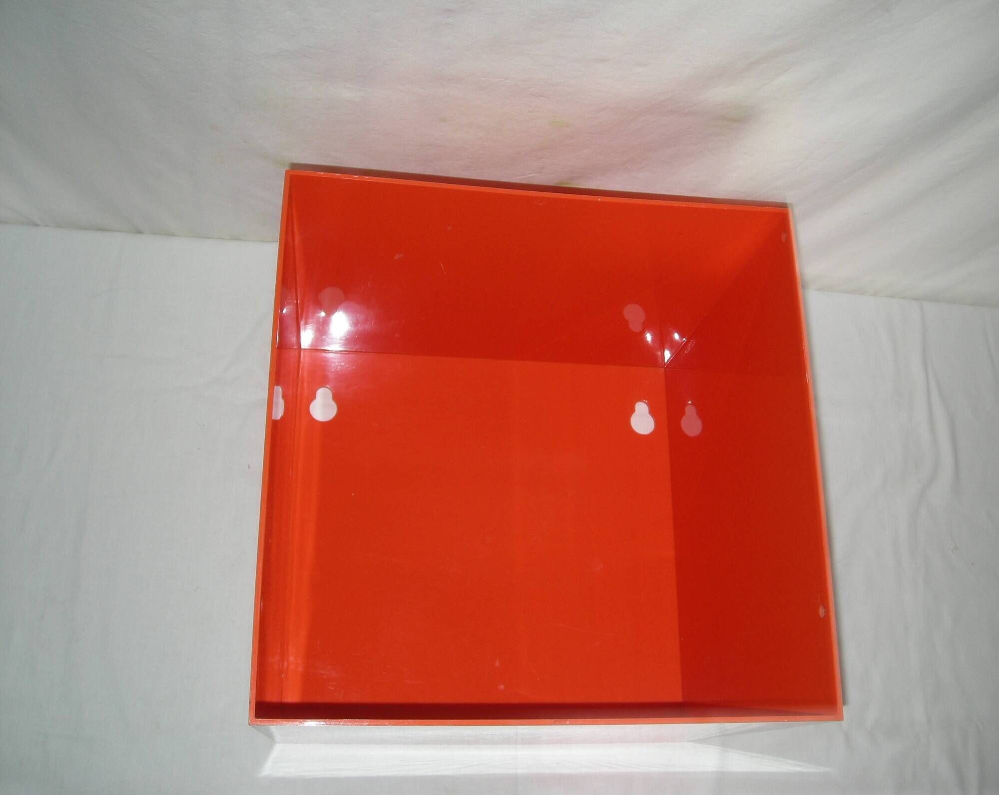 Orange cubic shelf from the 1970s.