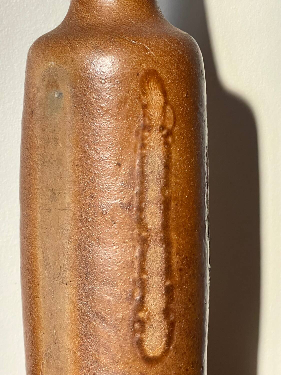 Antique stoneware bottle, 19th century.