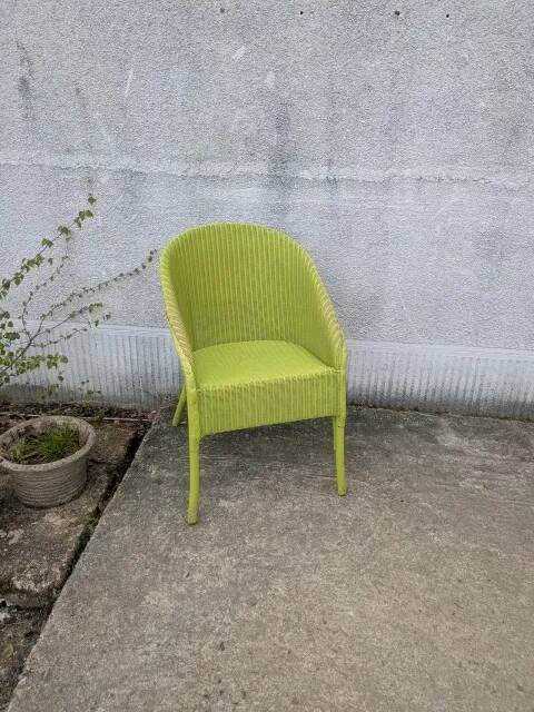 Lime green wicker armchair