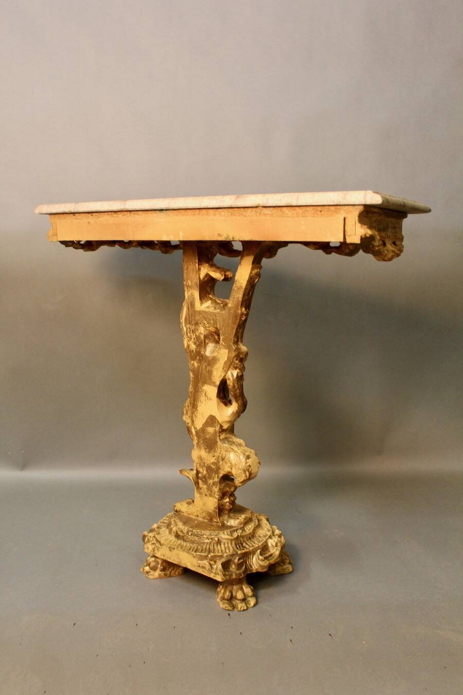 Marble top console and its rocaille style mirror