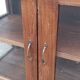Old wooden display cabinet with three glazed sides