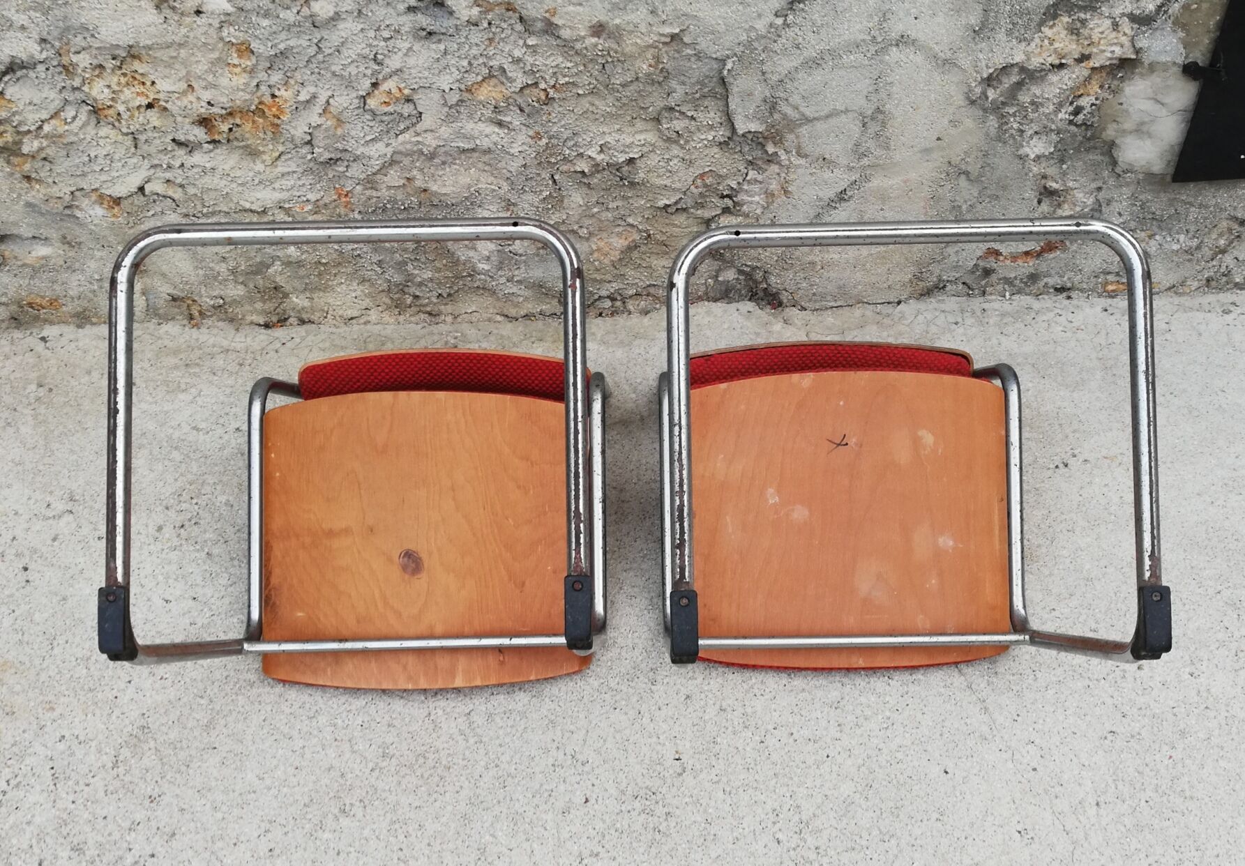 Red chairs cantilever chrome tubes