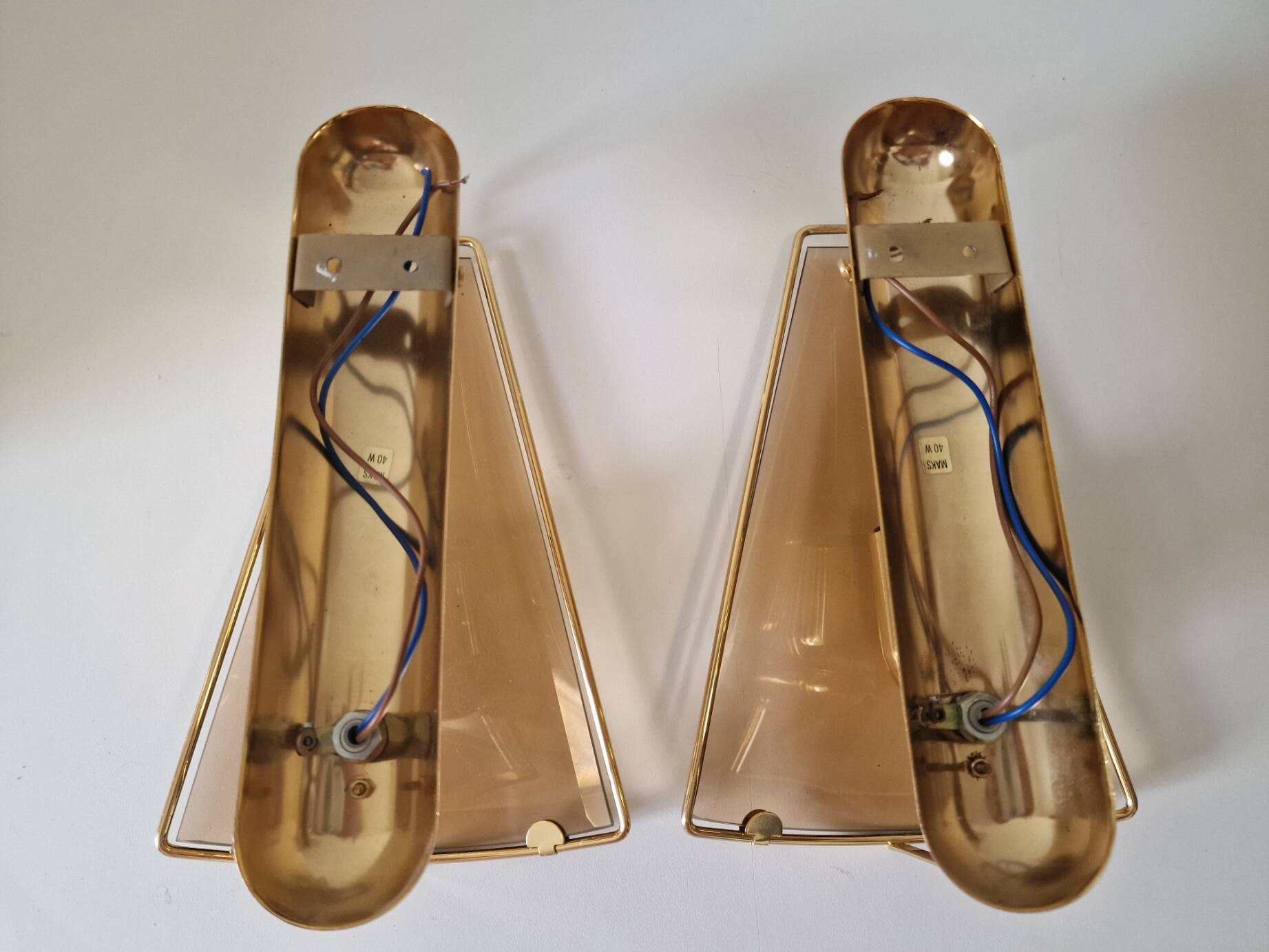 Pair of wall lights in brass and smoked glass by Lakro Amstelveen.