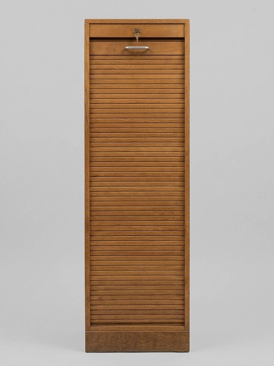 Wooden filing cabinet from the 1970s.