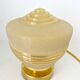 Old globe table lamp in beige and gold glass