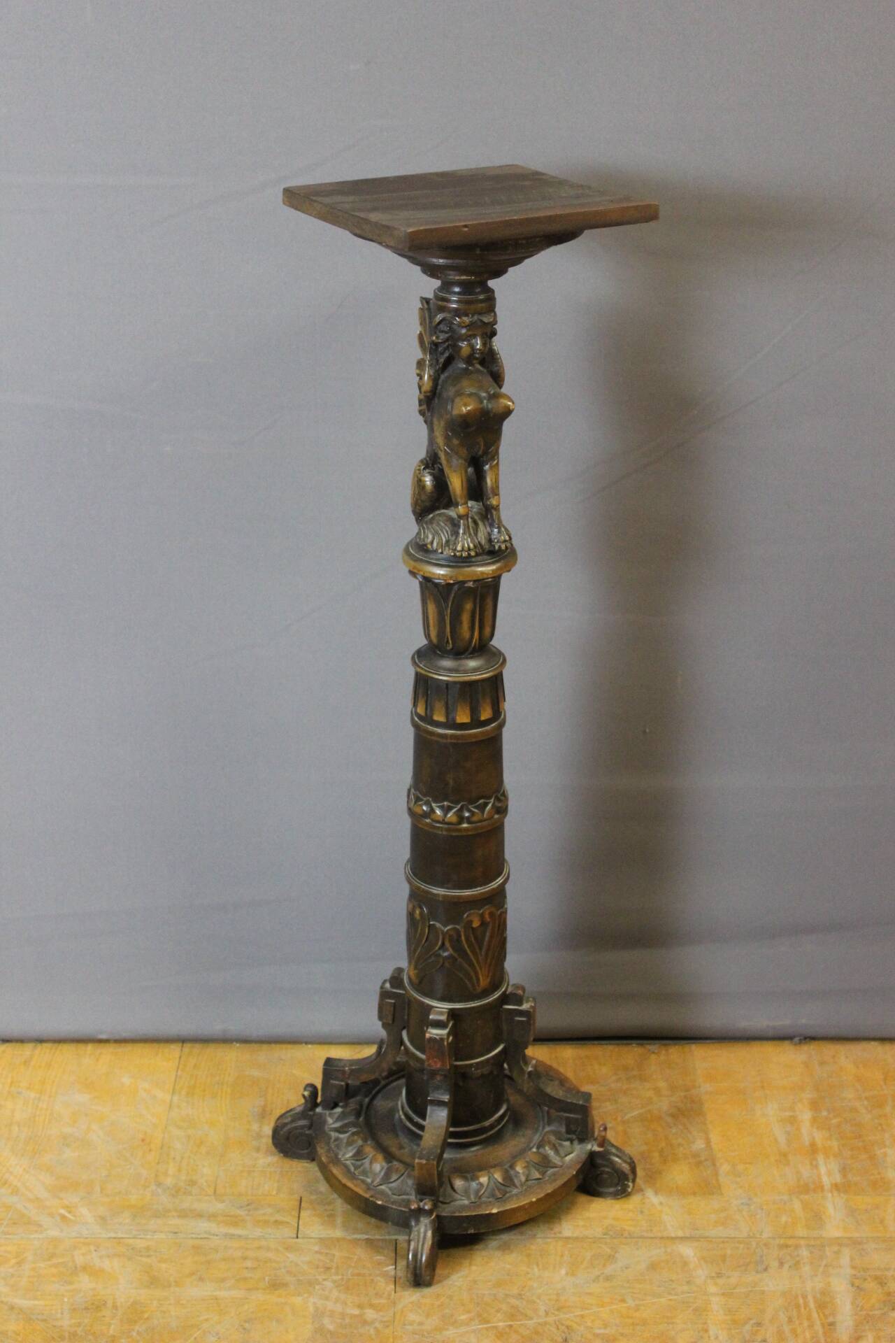 Presentation column with a carved Sphinx decoration from around 1900.