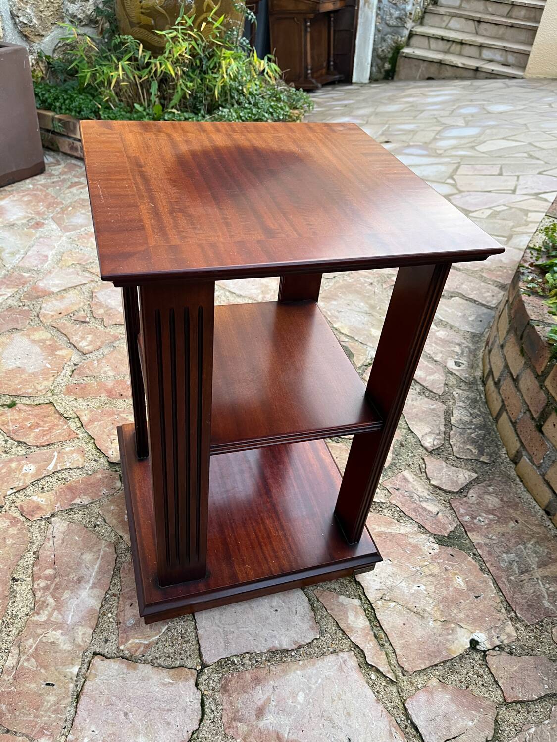 Vintage wooden shelf on caster legs