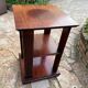 Vintage wooden shelf on caster legs