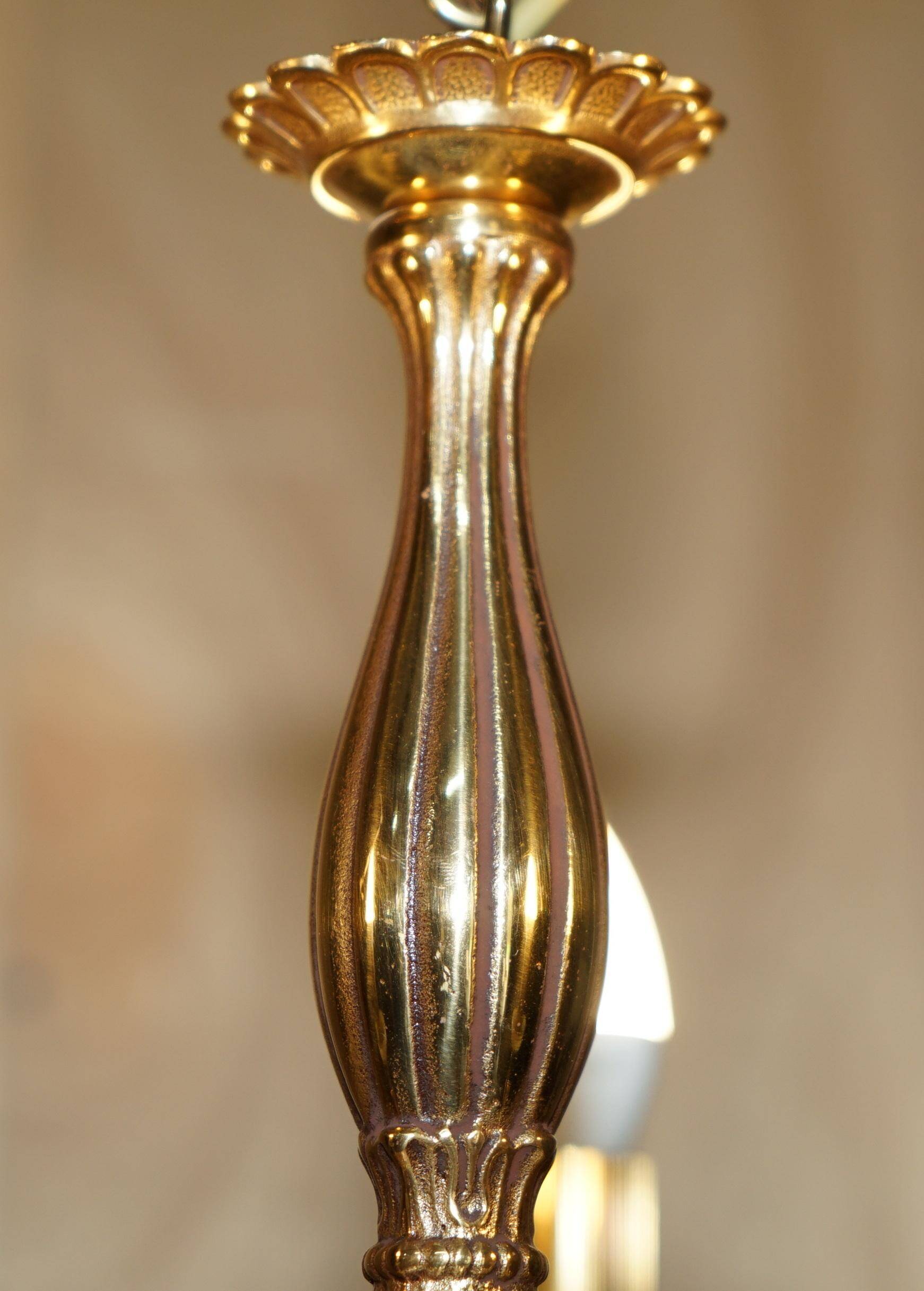 Reccagni chandelier in bronze and frosted glass.