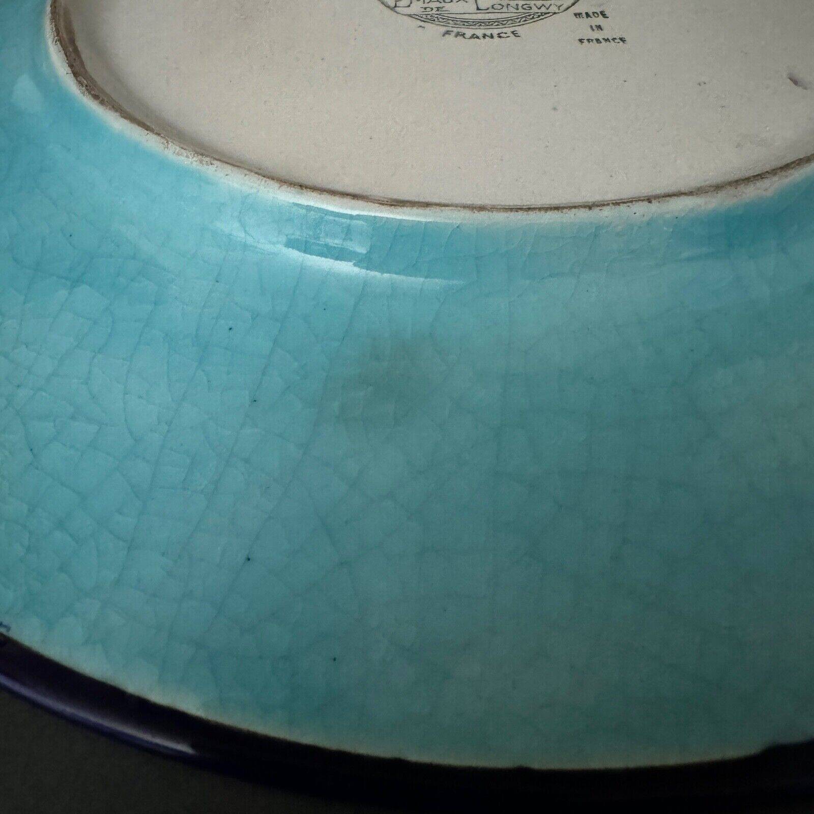 Longwy enamel dish decorated with a port scene