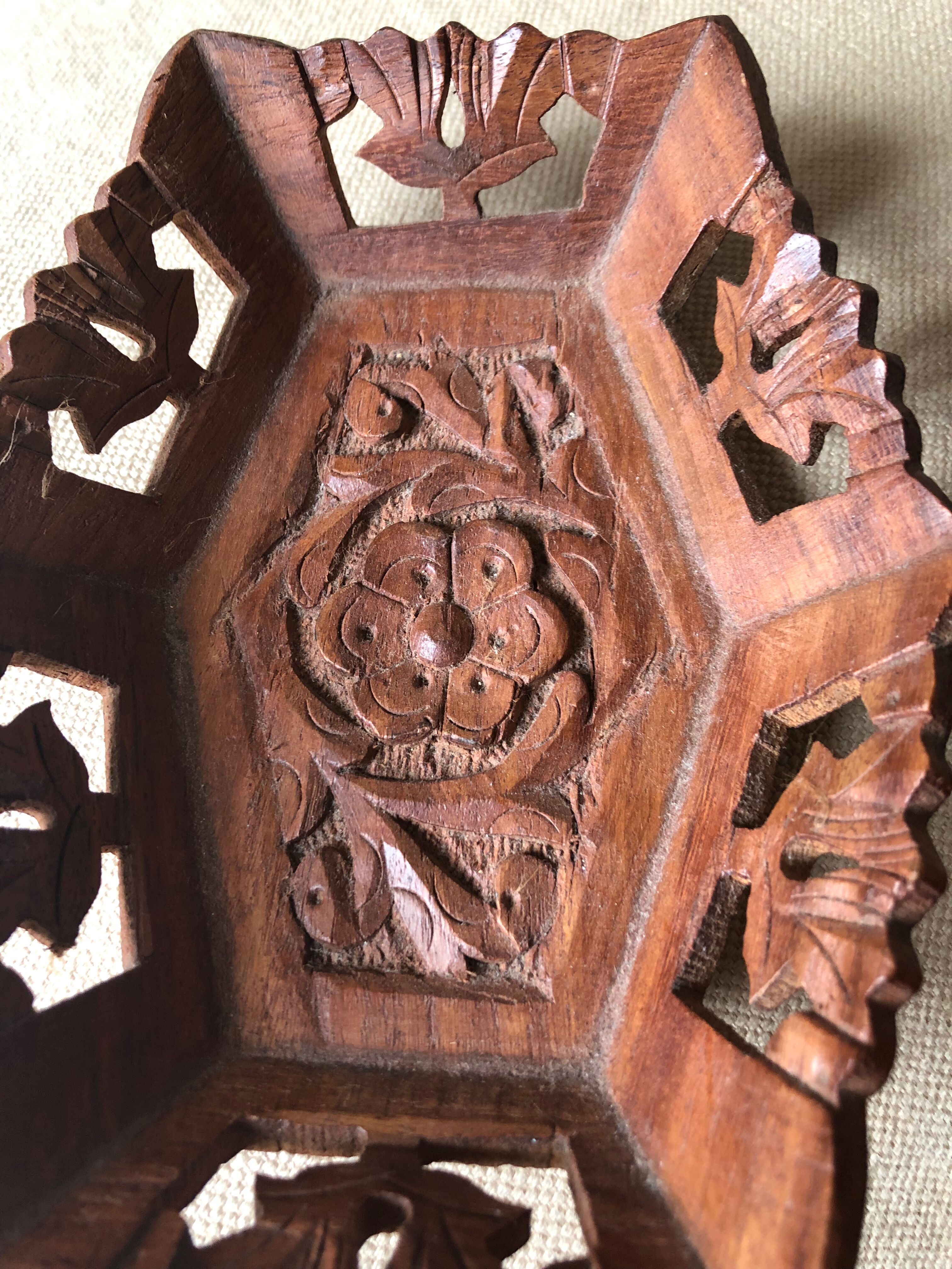 Empty carved rosewood pocket