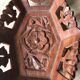 Empty carved rosewood pocket