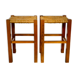 Two light wooden stools varnished and mulched seat