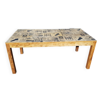 Teak dining table with illustrated top