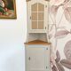Corner unit in 2 parts, grey/beige and cane work.