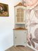 Corner unit in 2 parts, grey/beige and cane work.