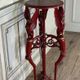 Athenian carved wood, red patina imitation of red marble