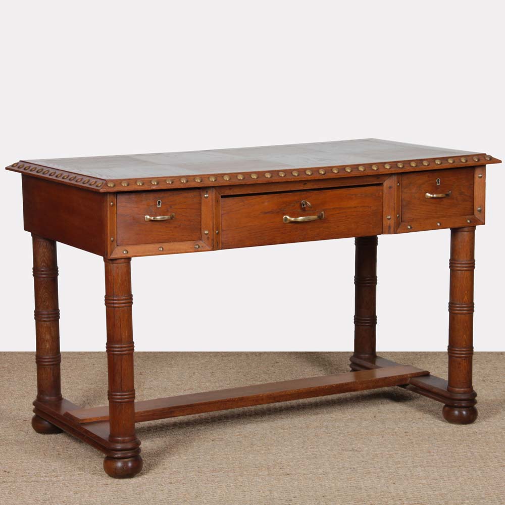 Oak and brass desk in the style of Charles Dudouyt, 1940.