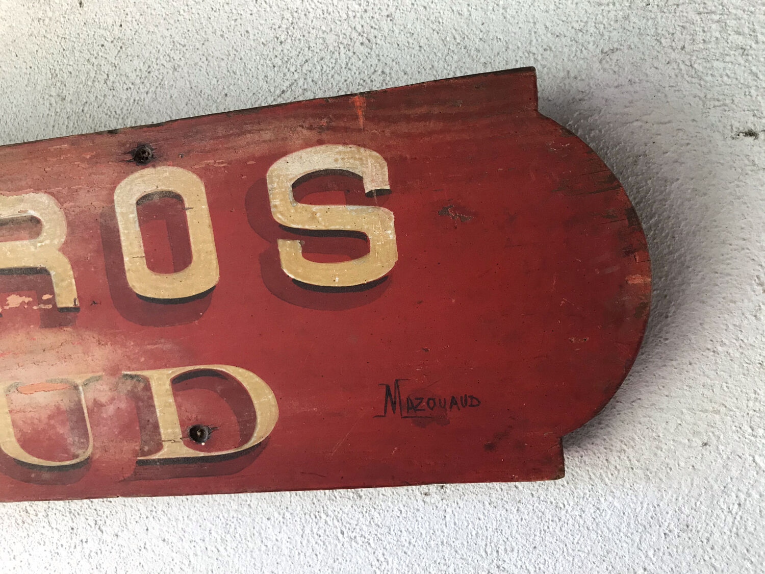 Painted wood sign