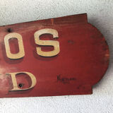 Painted wood sign