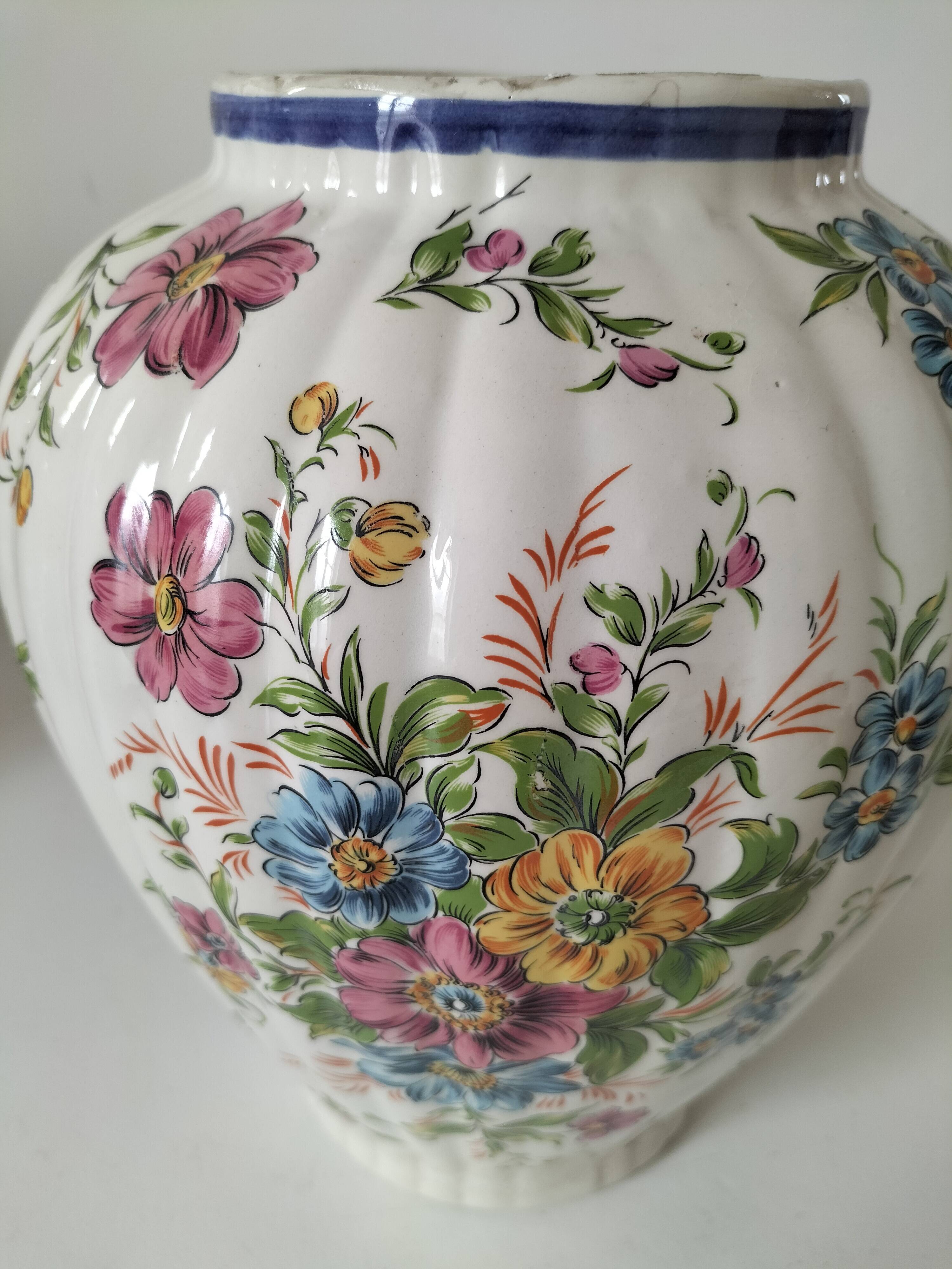 Antique vase with floral decoration in enamelled earthenware – timeless charm