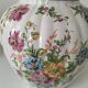 Antique vase with floral decoration in enamelled earthenware – timeless charm